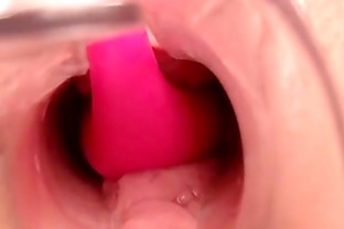Sexy girls uses speculum and vibrator