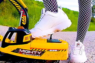 Big excavator is destroyed kicked, toycrush, plastic car, jumps , smashes car, trample, trampled, crushed, smashed, crushed, broken plastic car, crush toy car, sneaker , toy, toycrush, plastic car, jumps , smashes car, trample