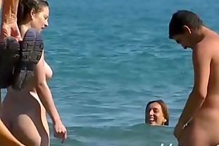 This adorable brunette nudist chicks is smearing lotion