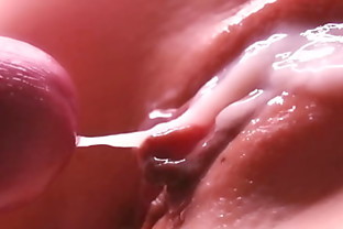 Slow motion. Cum between her labia. Close-up