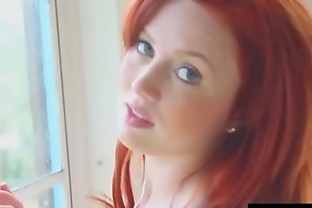 Pale skinned redhead babe Molly Shaw stripping outdoor