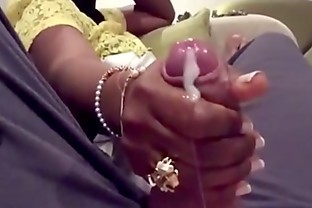 Desi woman gives young man handjob on train