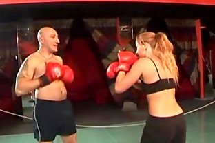 Hot boxer girl gives a blow job in the ring