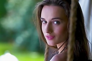 Ukrainian Gloria Sol drops down her swimsuit outdoor