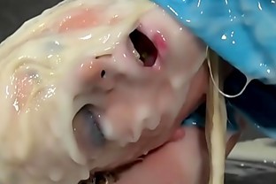 Gloryhole slut bukkaked