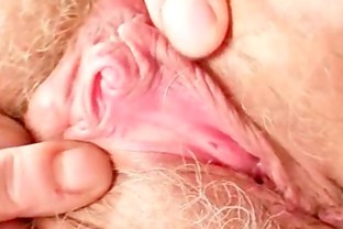 Grandma in uniform spreads blond hairy pussy