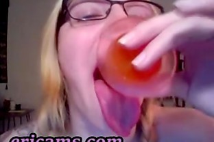 Blonde girl deepthroats a dildo with her tongue out!