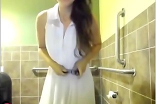 Slut masterbates in public bathroom
