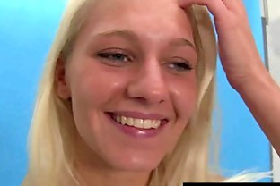 Busty blonde teen Sara posing