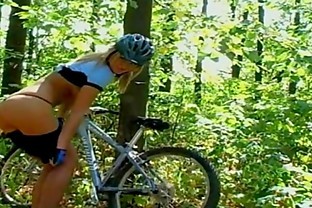 Super hot sporty girl plays with herself in the forest