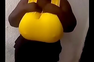 Huge breasted African girl dancing