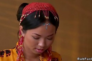 Thai masseuse gives footjob